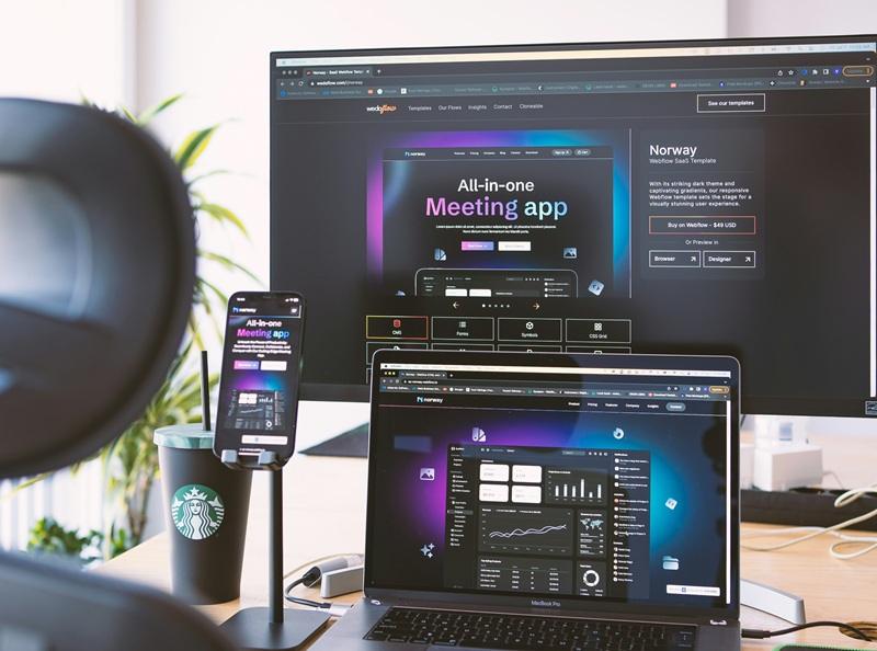 Example of responsive design  images on a monitor, laptop, and phone.
